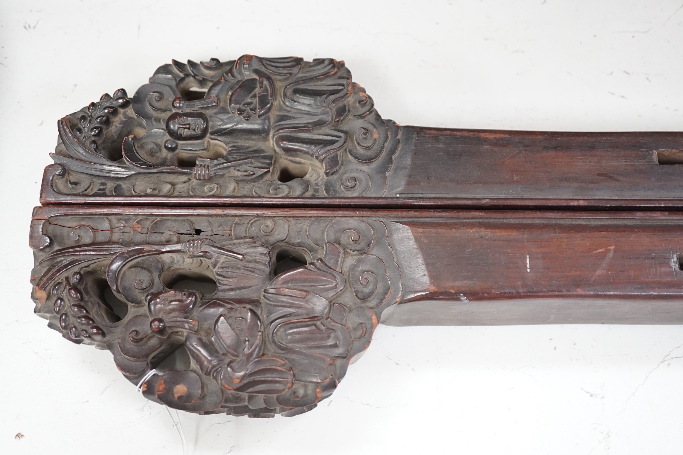 A pair of 19th century Chinese carved hardwood rails, 93cm